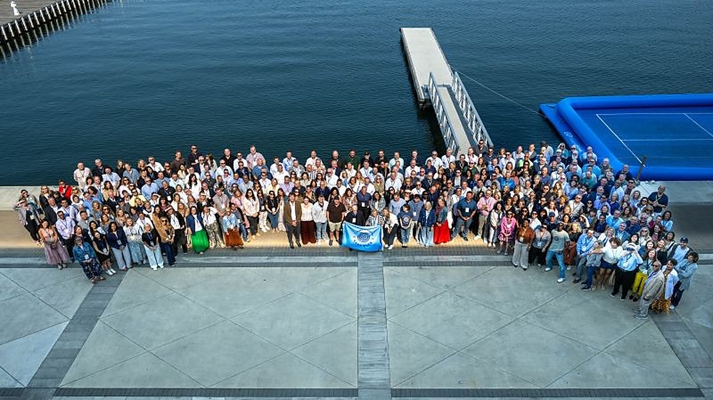 The full Camp Buck group photographed from above on the dock
